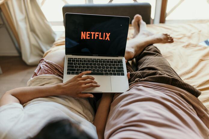 Netflix stock: are markets mispricing the Warner deal impact?